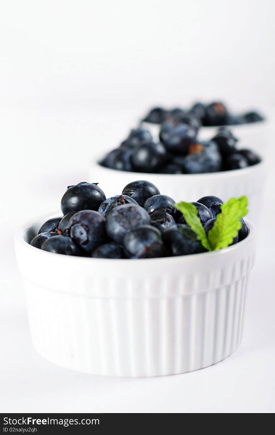 Fresh blueberries in a row vertical