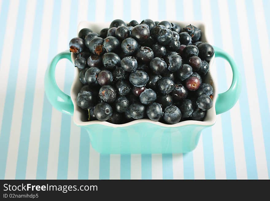 Bowl of blueberries on lines