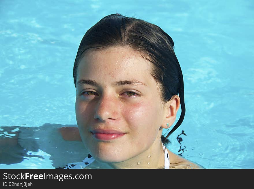 Girl in the swimming pool