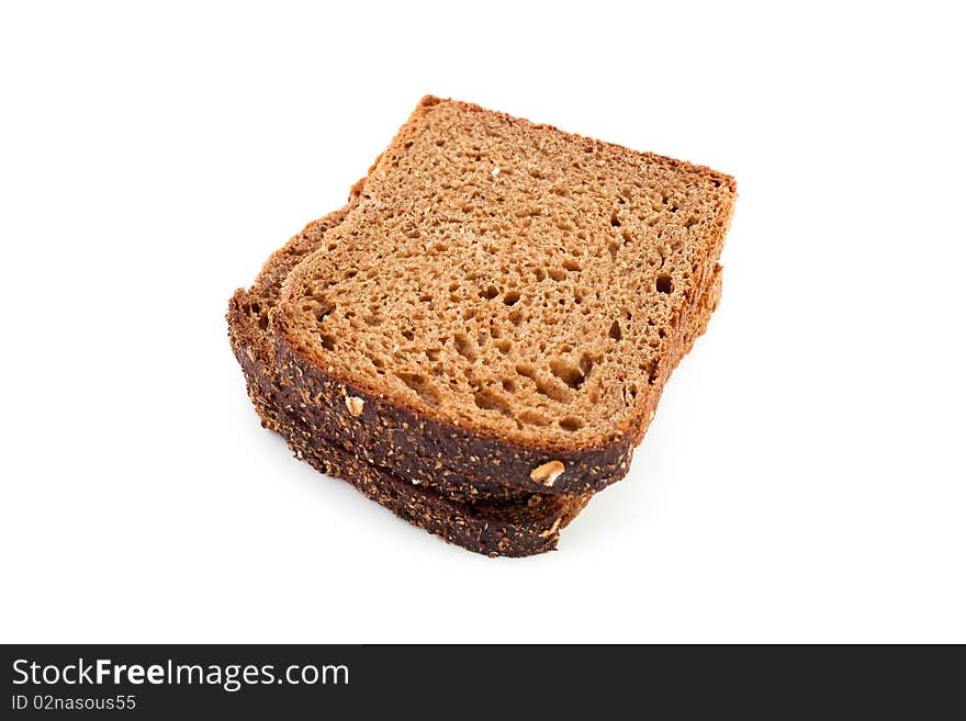 An image of slices of dark bread on white background. An image of slices of dark bread on white background