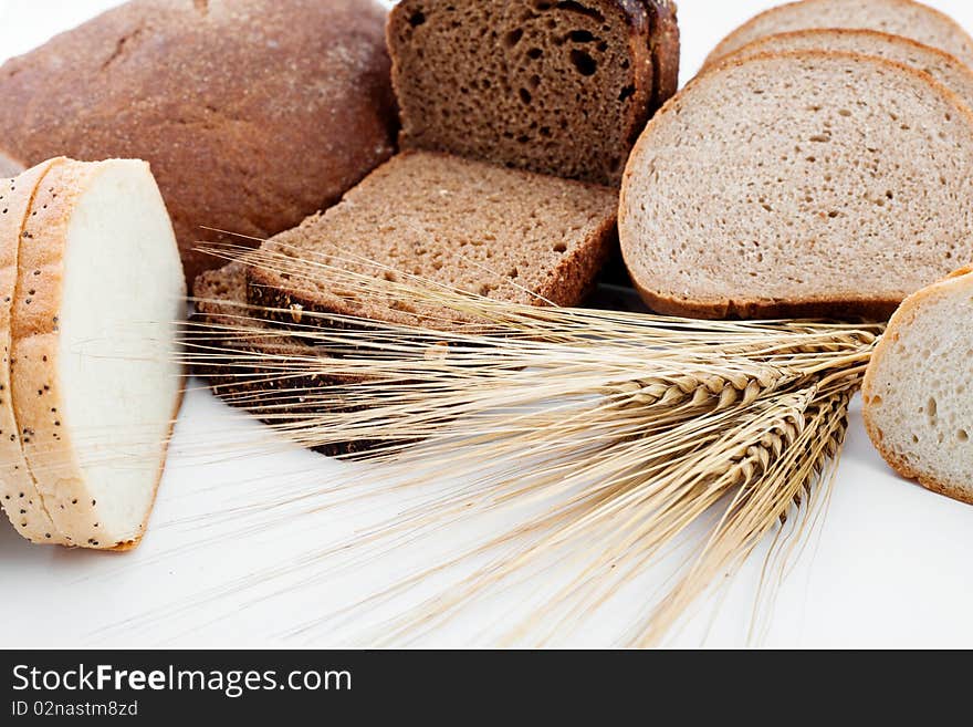 An image of various sorts of bread and spikes. An image of various sorts of bread and spikes