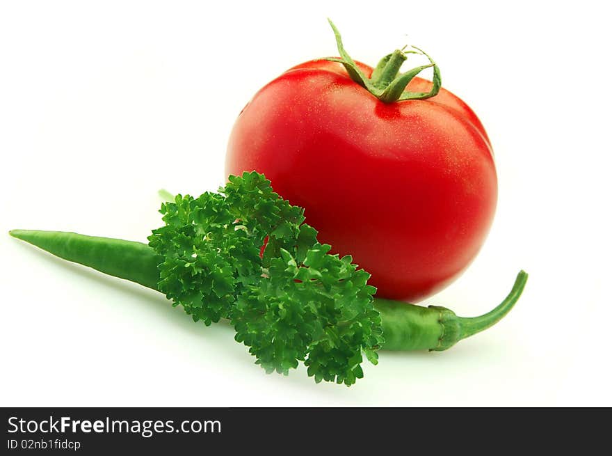 Tomatoes and hot pepper with parsley