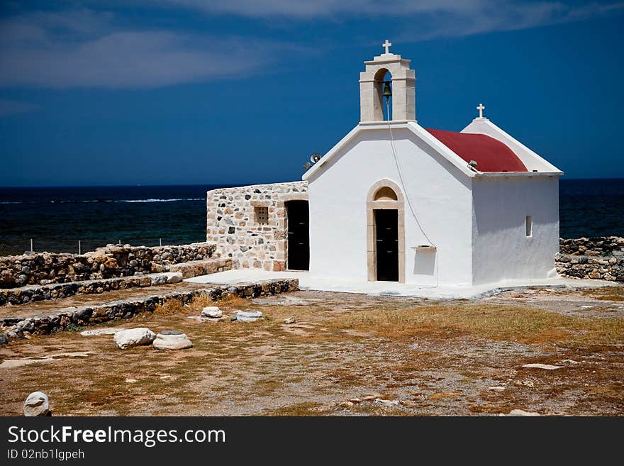 Greek small white church at the seaside. Greek small white church at the seaside