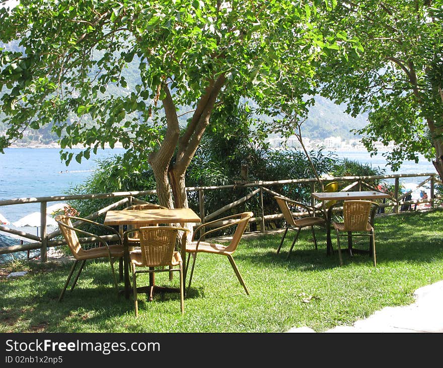 Cafe Near Sea Comfortable Tables And Chairs