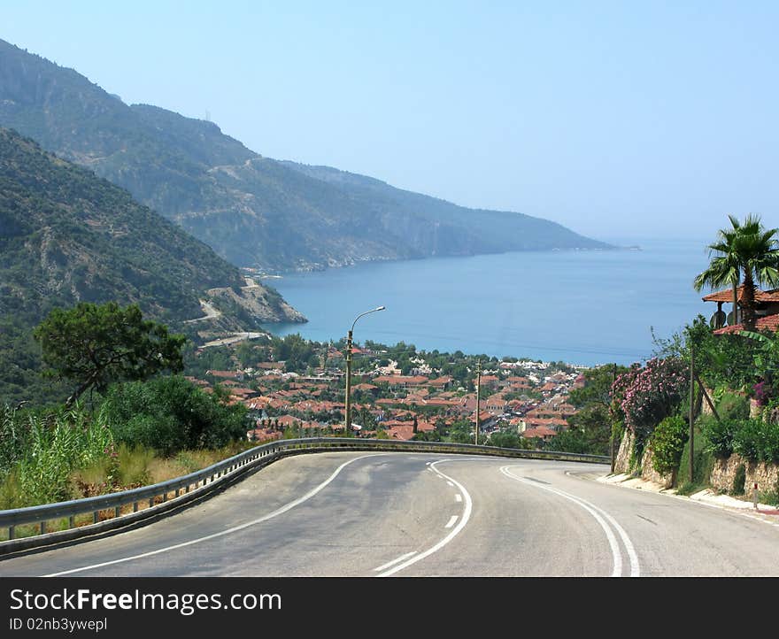 Road to famous sea resort among high mountains