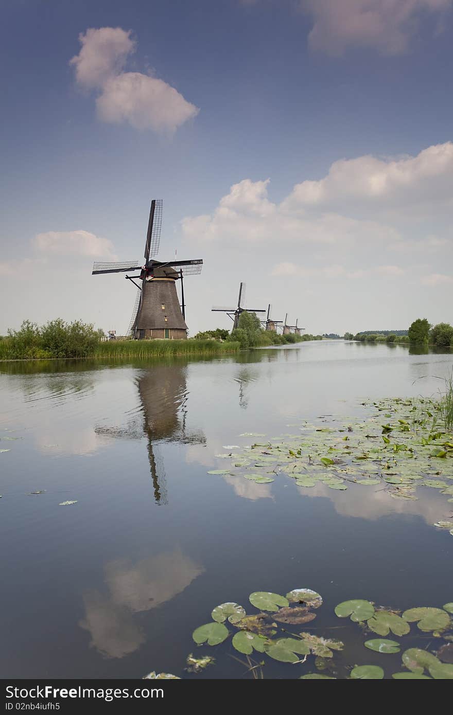 Traditional Windmills On River