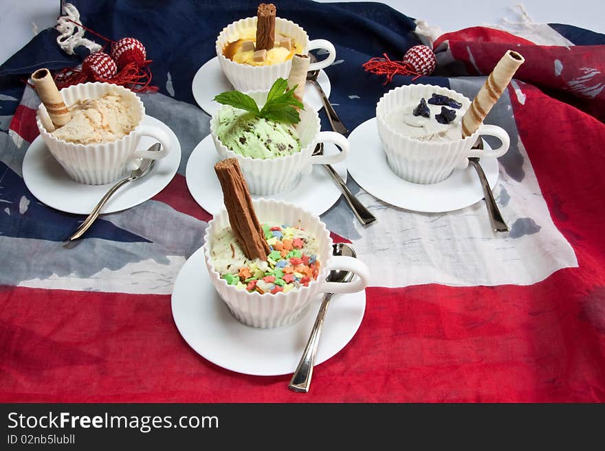 Tea cups filled with ice creams & toppings. Tea cups filled with ice creams & toppings