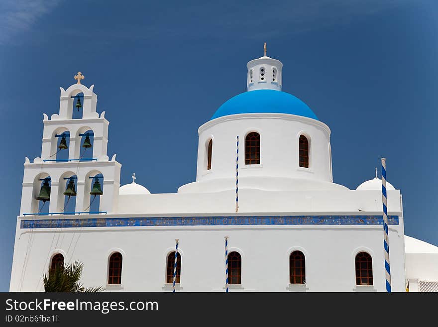 Santorini beautiful volcanic island in Greece landscape with blue churches, windmills and volcanic caldera