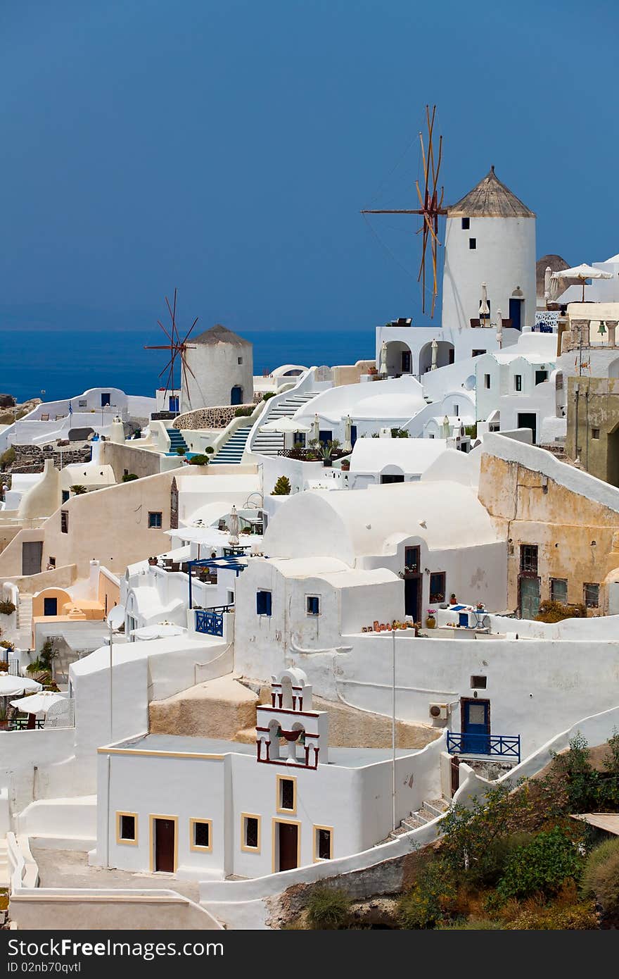 Santorini beautiful volcanic island in Greece landscape with blue churches, windmills and volcanic caldera