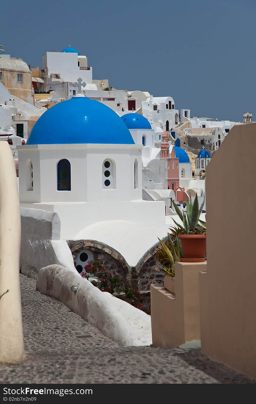 Santorini beautiful volcanic island in Greece landscape with blue churches, windmills and volcanic caldera