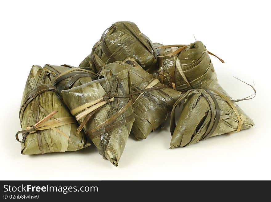 Rice dumplings (Chinese traditional food) on white background.