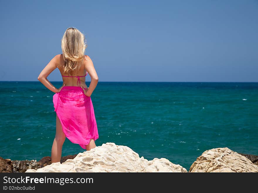 Natural caucasian woman tanning on exotic beach. Natural caucasian woman tanning on exotic beach