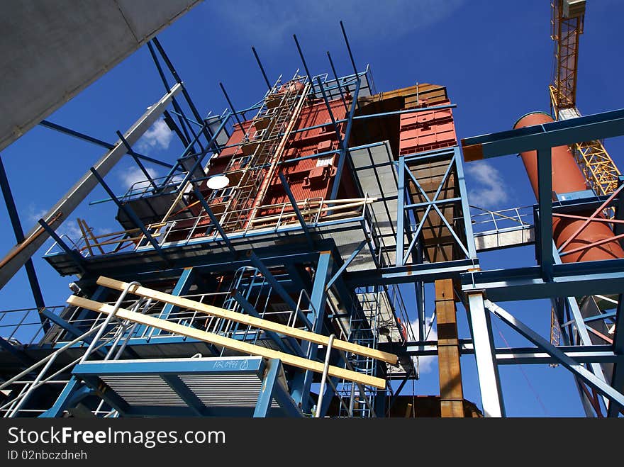 Cranes and beams on construction of industrial factory. Cranes and beams on construction of industrial factory