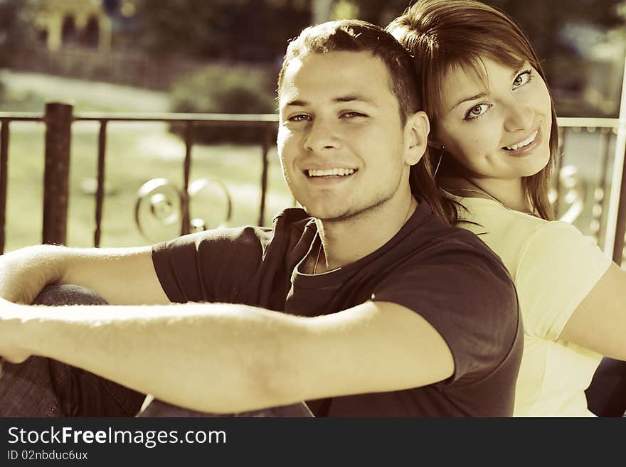 Portrait of couple on the bench in the park