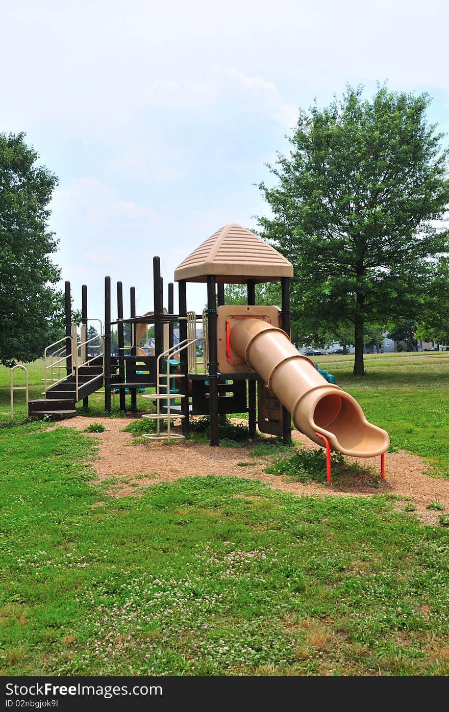 Slides and other playground equipment in a public park