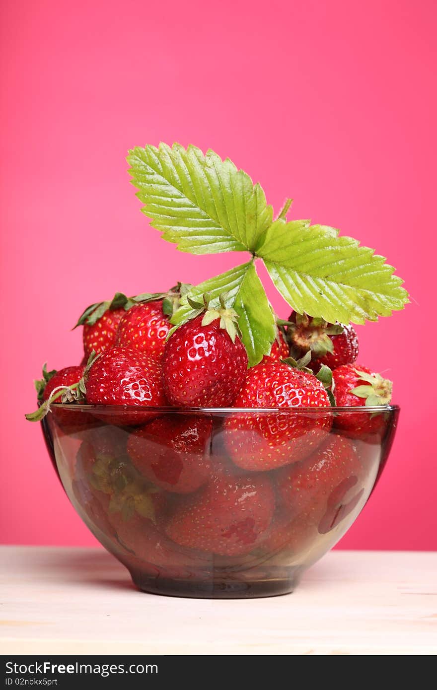 Close-up view of the bowl with fresh strawberry. Close-up view of the bowl with fresh strawberry