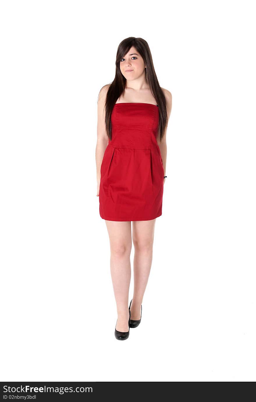 Young beautiful girl with red dress standing isolated on white background. Young beautiful girl with red dress standing isolated on white background.