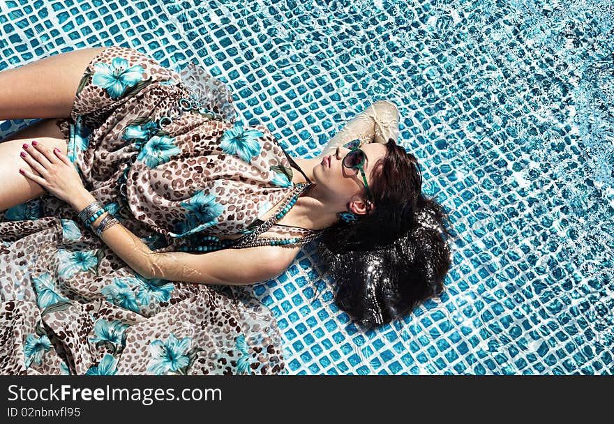 Young Woman At A Pool