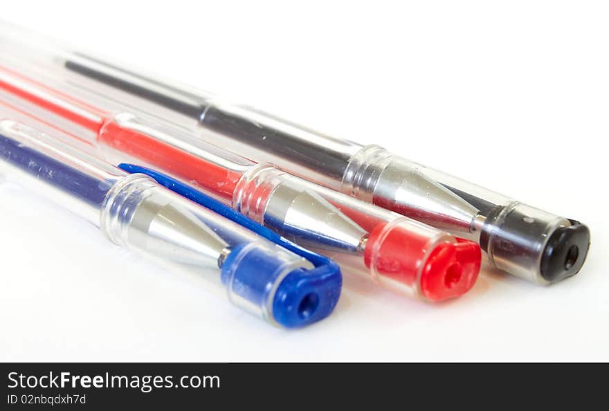 Three pens on white background