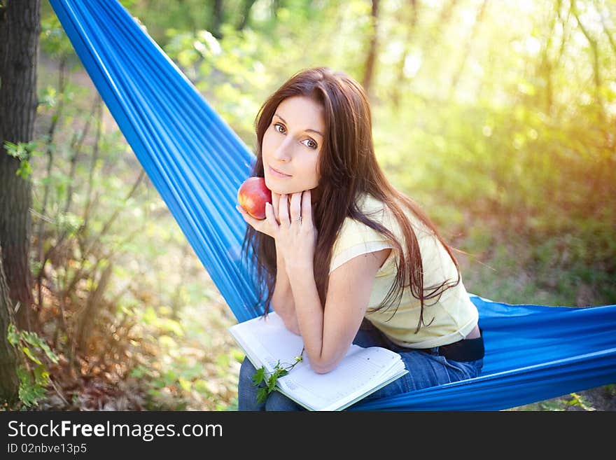 Young beautiful woman in a hammock. Young beautiful woman in a hammock