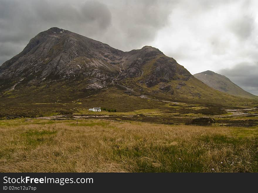 A landscape of the Highlands, Scotland. With a mountain rescue point. A landscape of the Highlands, Scotland. With a mountain rescue point.