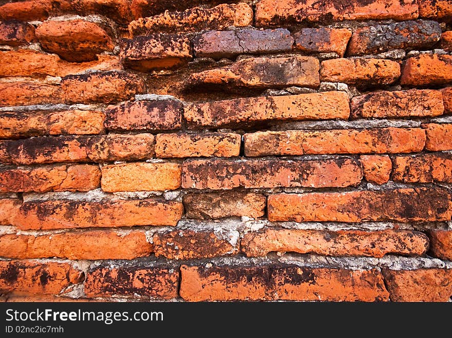 The part of ancient brick wall in Thailand