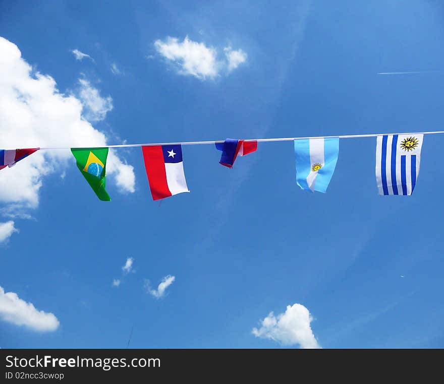 A collection of flags put up to support various nations in the world cup. A collection of flags put up to support various nations in the world cup.