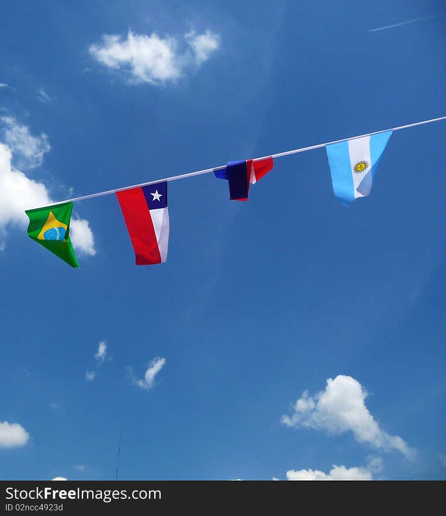 A collection of flags put up to support various nations in the world cup. A collection of flags put up to support various nations in the world cup.