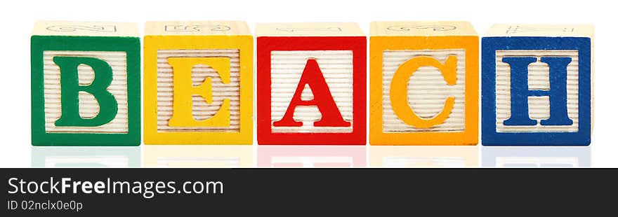 Colorful alphabet blocks. spelling the word beach. Colorful alphabet blocks. spelling the word beach.