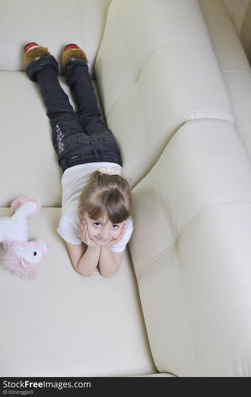 Happy cute little girl relax