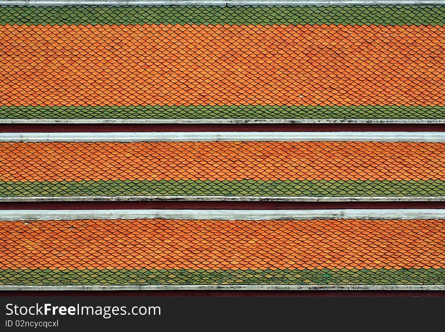 Clay tiles on Temple roof Thailand