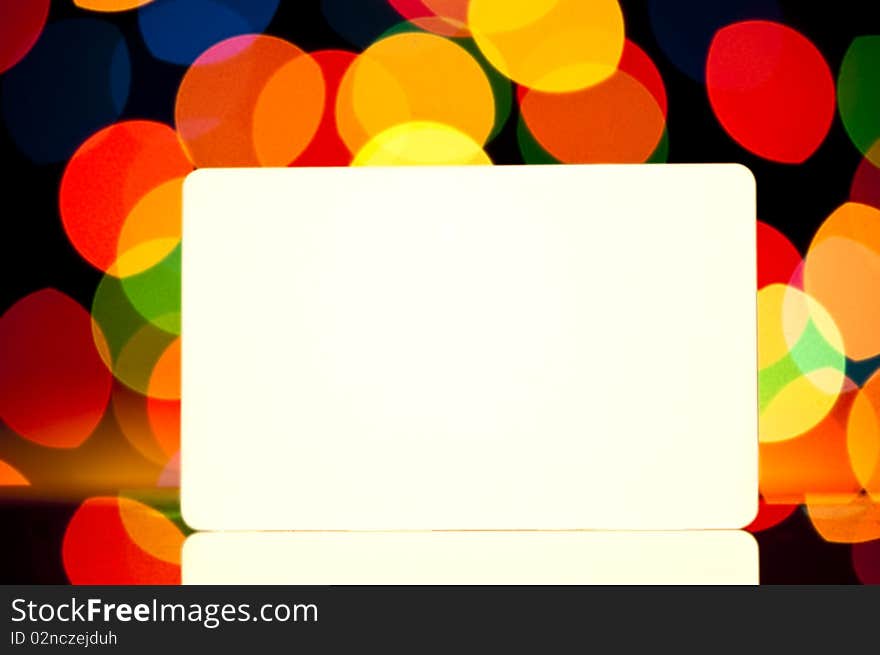 Business card against abstract light background for your design