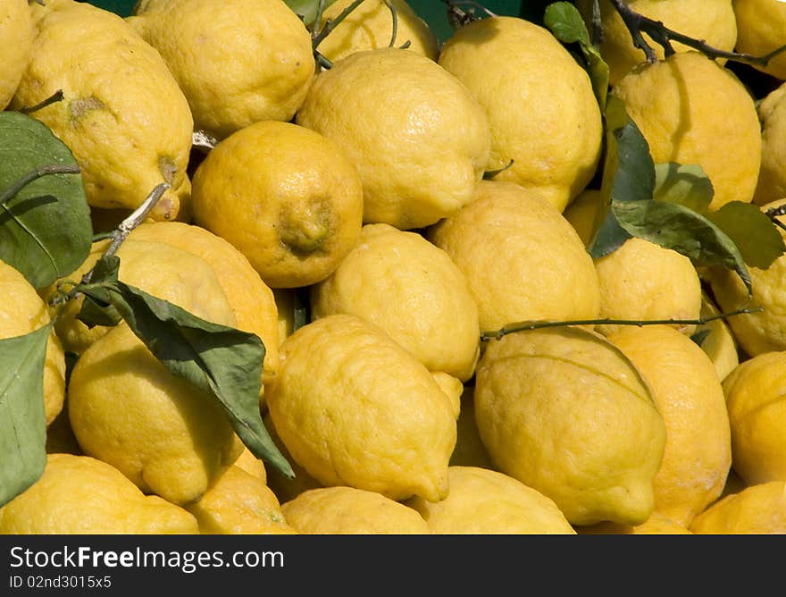 A background of yellow lemons