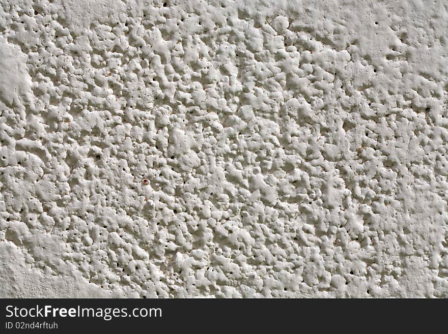 Close up of Grunge white cement wall : can be used as background