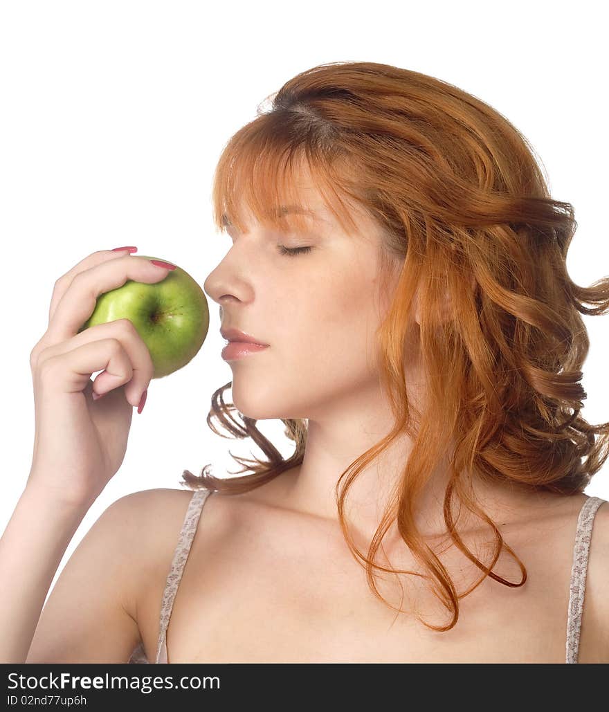 Healthy redhead young woman holding fresh green apple. Healthy redhead young woman holding fresh green apple