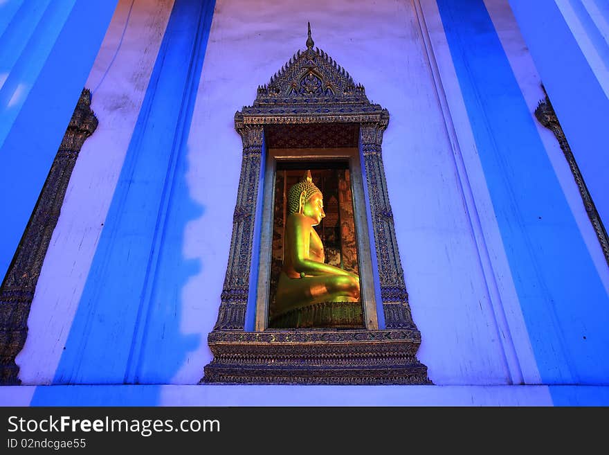 Golden buddha statue twilight , Bangkok, Thailand. Golden buddha statue twilight , Bangkok, Thailand