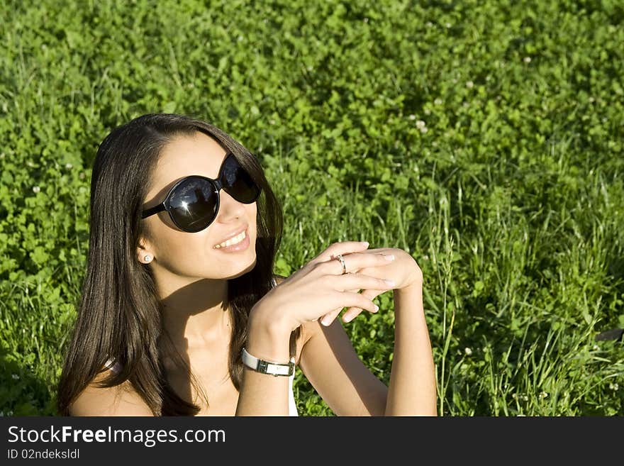 Beautiful young woman outdoors in nature. Portrait. Beautiful young woman outdoors in nature. Portrait