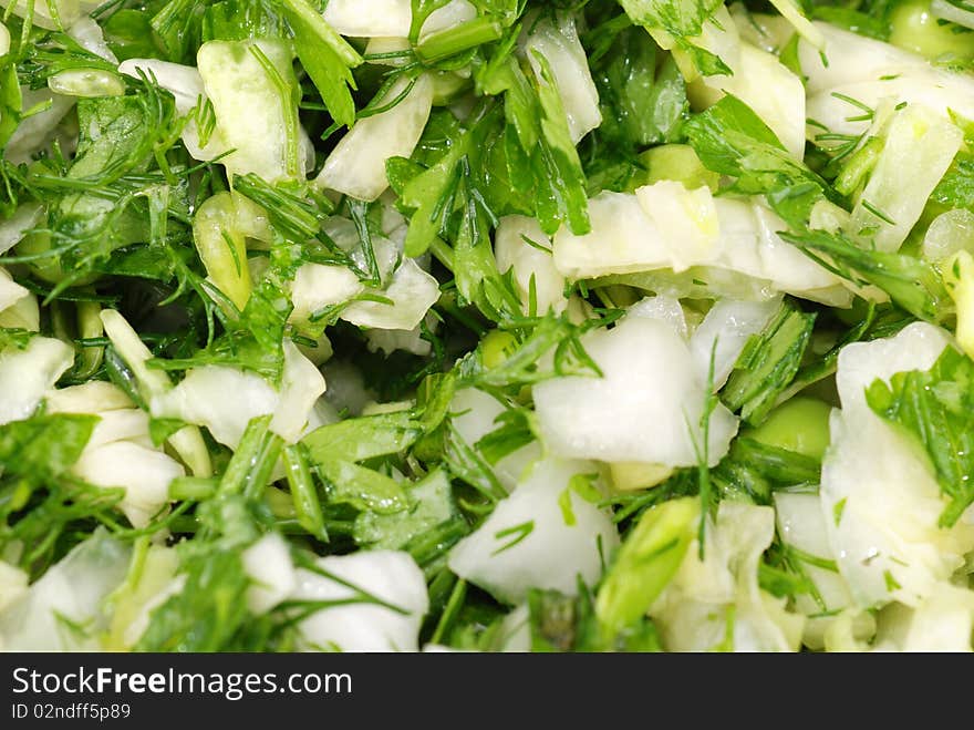 Fresh salad from vegetables and greens on a plate. Fresh salad from vegetables and greens on a plate