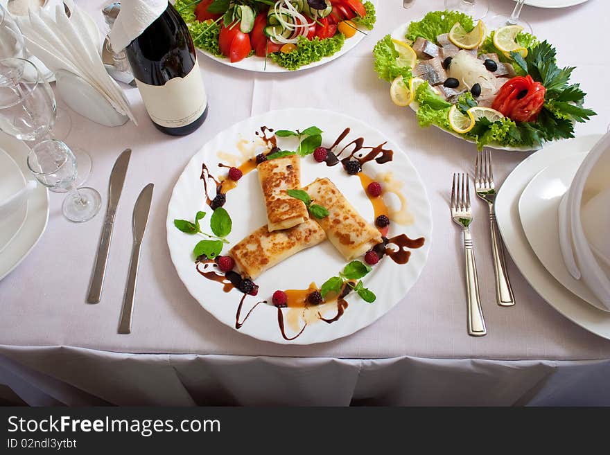 Celebratory table with tasty dishes set for a dinner