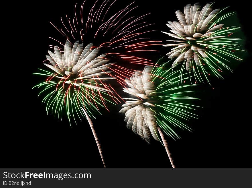 Green and white fireworks explosion