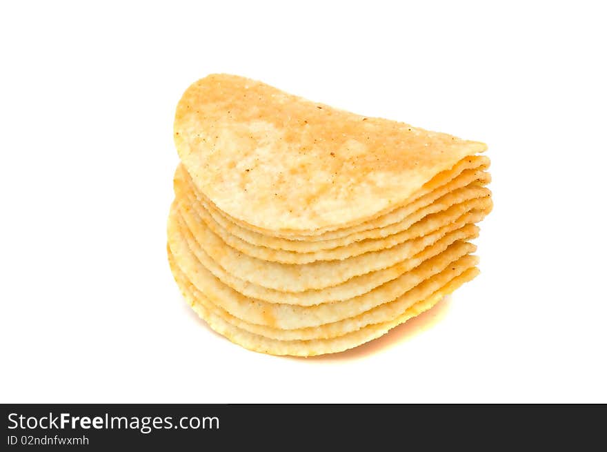 A pile of potato chips isolated on a white background