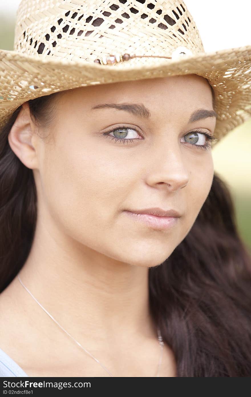 Girl wearing summer hat