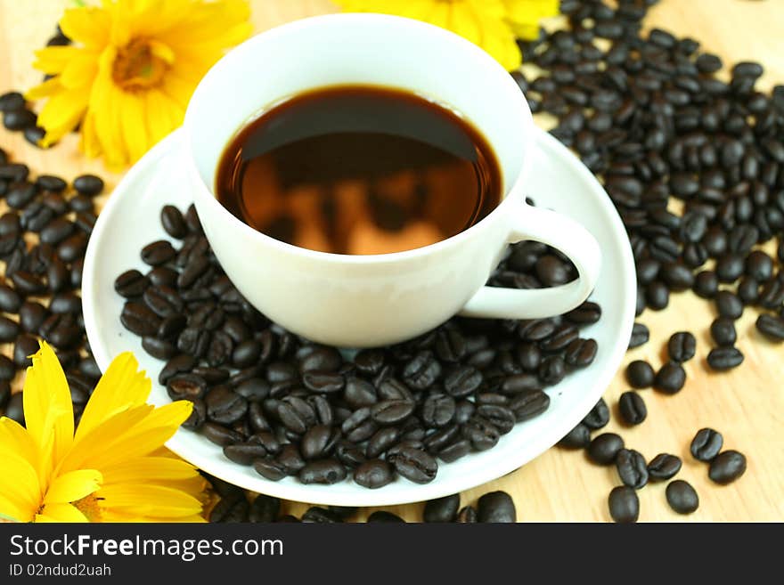 Black coffee with flowers