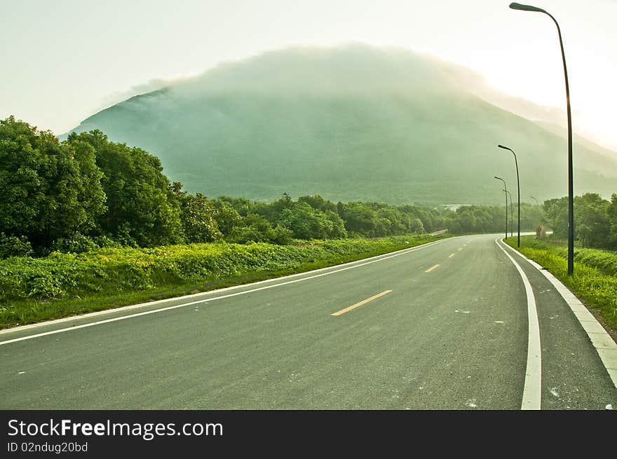 A road extend to the mountain