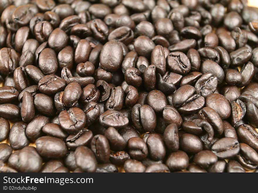 Coffee beans background. Dark roasted. Coffee beans background. Dark roasted