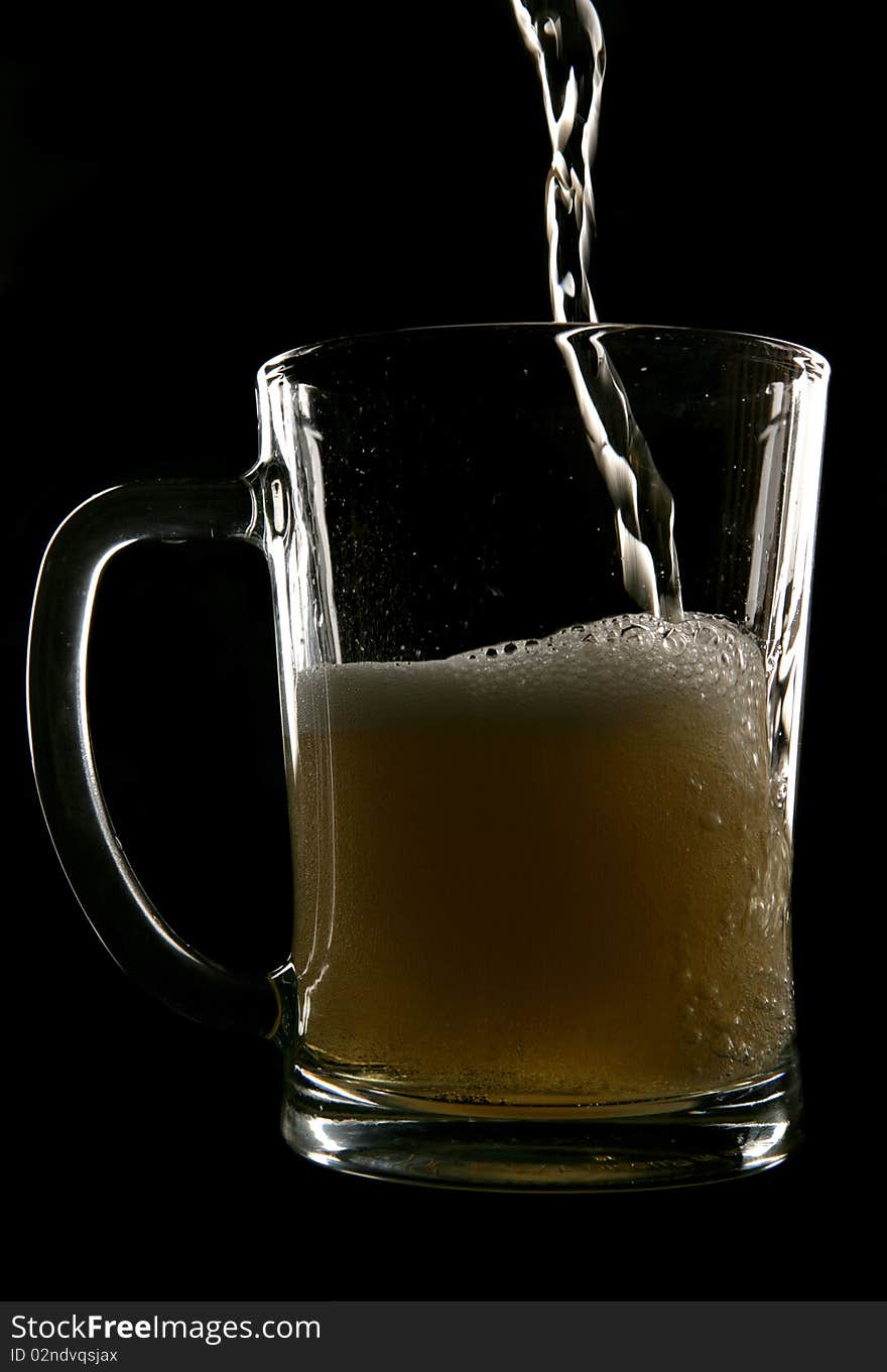 Cider Being Poured Into Pint Glass