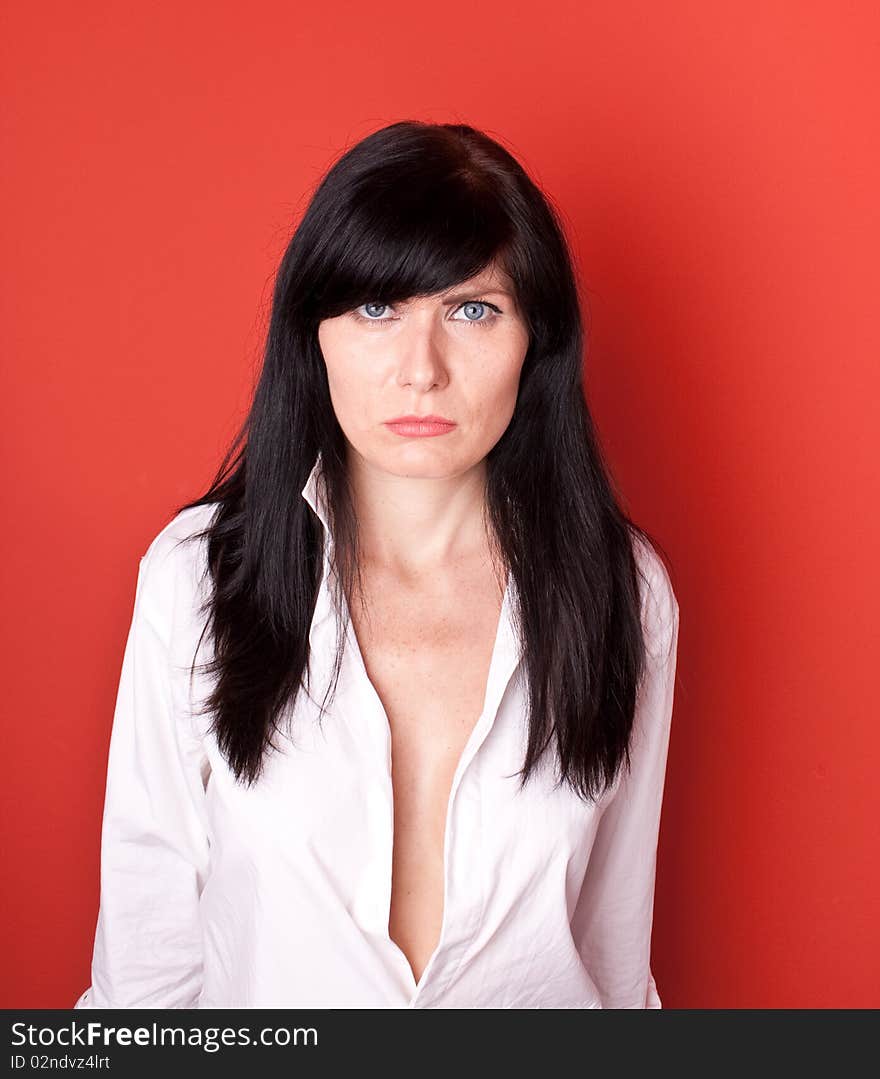 Woman's portrait on red background. Woman's portrait on red background