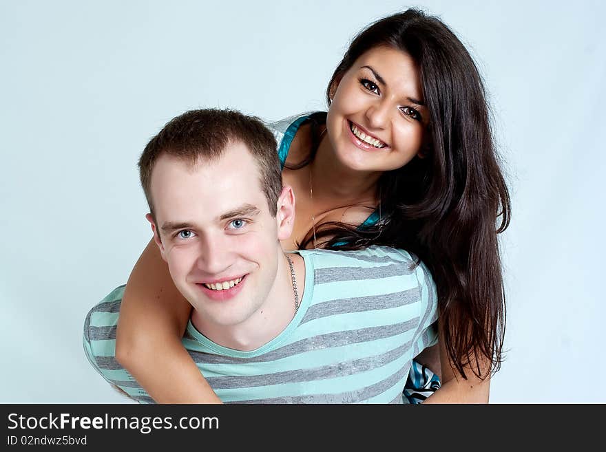 Young couple on a white background