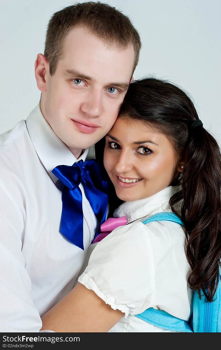 Two happiness fun students on a white background