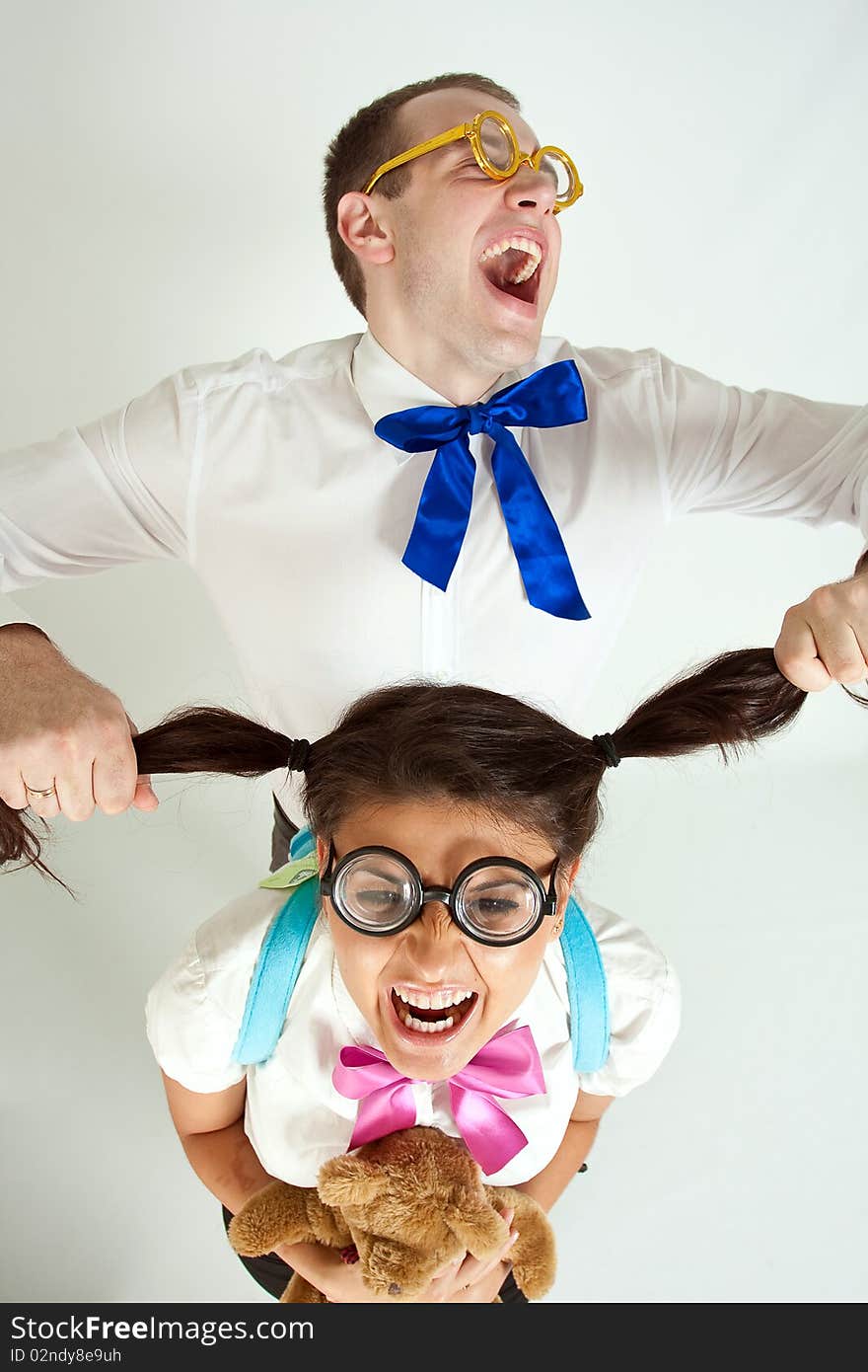 Two happiness fun students on a white background